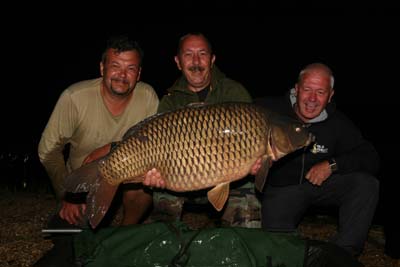 Andrey Stars and Jim with 55lb 14oz.jpg